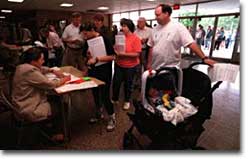 Citizens of a New England village attend a Town Meeting